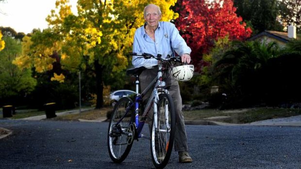 OVERWHELMED: Canberran Les Cook, who received many offers from people to replace his stolen bike, is back on the road this week.