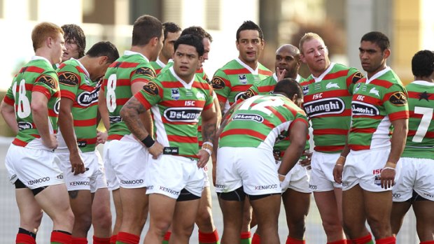 Dejected ... the Rabbitohs re-group after a try is scored against them.