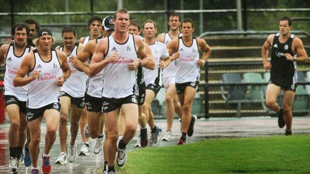 In weather better suited to ducks, the Magpies splash around Olympic Park in a two-kilometre time trial yesterday.