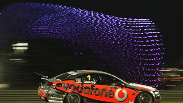 Fun under lights ... Jamie Whincup powers around the "unbelievably grippy"  Yas Marina  track in Abu Dhabi.