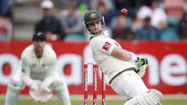 Reprieve &#8230; Australian opener Phillip Hughes appeared to have gloved the seventh ball of his innings to New Zealand wicket keeper Reece Young, but the tourists didn't challenge umpire Nigel Llong's not-out call.