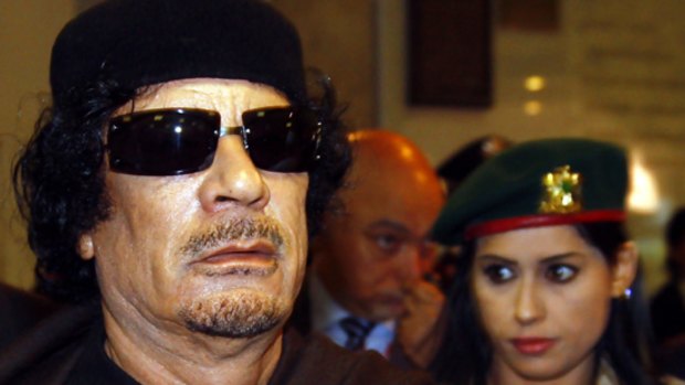Muammar Gaddafi arrives at the Food Security Summit in Rome.