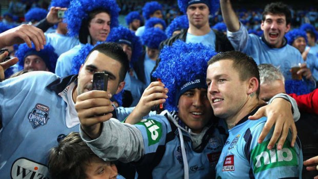 Patient: Todd Carney with Blues fans.