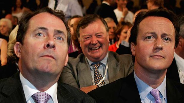 No laughing matter ... Liam Fox (left) and David Cameron.