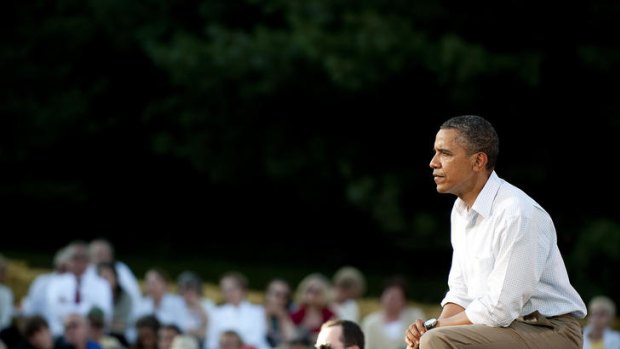 US President Barack Obama listens to questions as he speaks at a town hall style meeting in Decorah, Iowa.