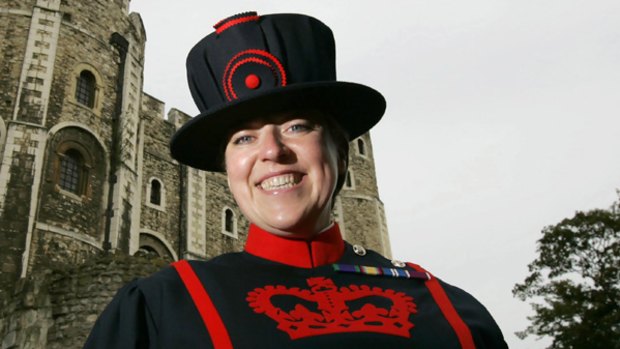 Bullied ... Beefeater Moira Cameron  in front of the  Tower of London in  2007.