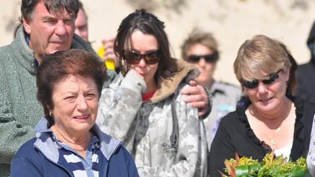 Kyle's grandmother (front, left) and mother Sharon (far right) at the memorial paddle-out at Bunker Bay this morning.
