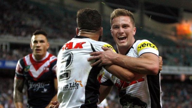 Chosen one: Penrith fullback Matt Moylan celebrates with Josh Mansour after the winger's try.
