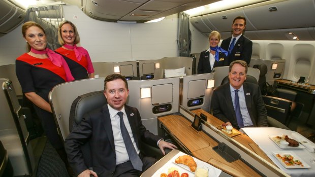 Qantas CEO Alan Joyce with American Airlines Chairman and CEO Doug Parker in First Class of the new B777-300ER aircraft.
