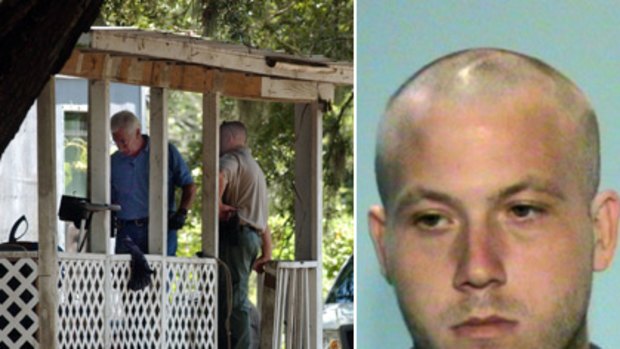 Eight slain ... (Left) Glynn County investigators on the porch of a mobile home where eight people were killed in Brunswick, Georgia, and (right) 22-year-old Guy Heinze Jr, who is in police custody.