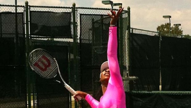 Hot pink . . . Serena Williams is back on the court.