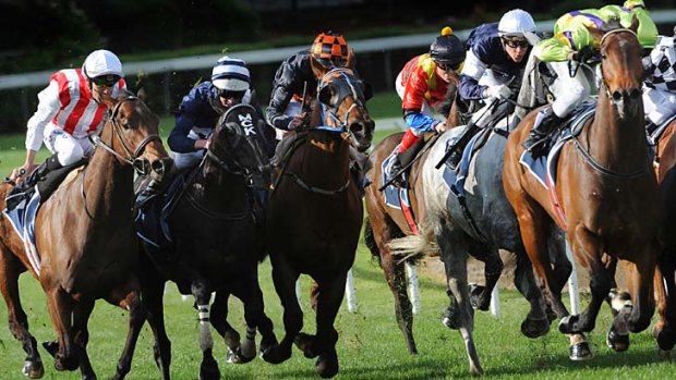 Outsider: Dwayne Dunn rides Rekindled Interest (left) to victory at Moonee Valley yesterday.