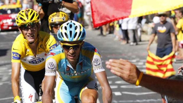Man on man . . . Race leader Andy Schleck closely marks defending champion Alberto Contador as Tour de France enters the Pyrenees.