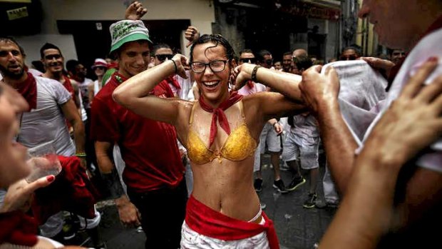 Revellers celebrate the official opening of the 2014 San Fermin fiestas, in Pamplona, Spain.