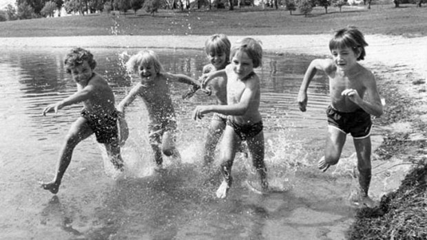 Back in the day ... kids splash into Lake Burley Griffin on a summer's day in 1978.