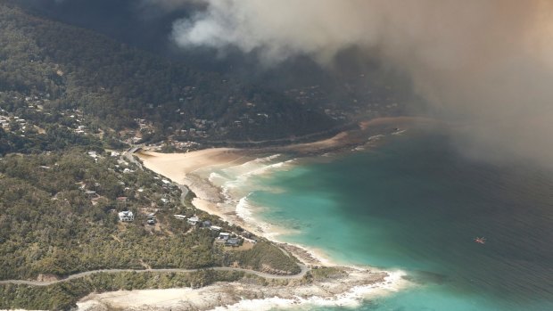 Fires burn near Wye River and Seperation creek by popular tourist destination on the Great Ocean Road on December 25, 2015 