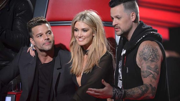 Starting strong in 2013: Three of the show's four "judges", from left, Ricky Martin, Delta Goodrem and Joel Madden.