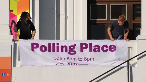 AEC and Old Parliament house staff ready the OPH for polling early on Saturday morning.