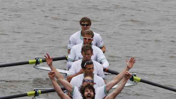 We won ... the Cambridge rowing team celebrates.