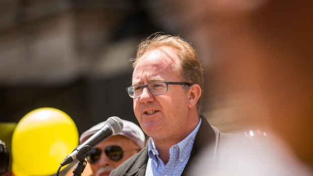 David Feeney speaks to members of the Taxi industry at a protest.