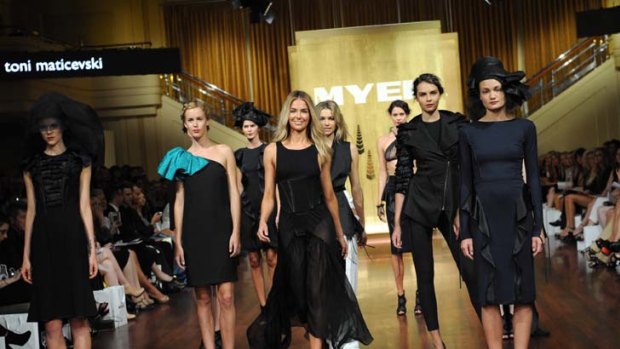 Saleable &#8230; Myer face Jennifer Hawkins, centre, leads the charge at the department store's winter season launch for 400 in Melbourne.