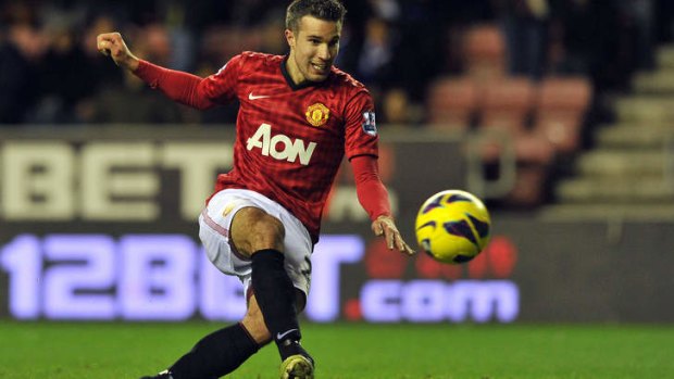Good start to the year ...  Robin van Persie scores United's fourth goal.