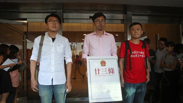 Avery Ng (centre) pictured last year with other local election candidates, Edward Leung of Hong Kong Indigenous party and Chan Tak-cheung from the League of Social Democrats.