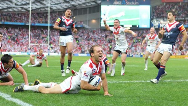 Dragons Jason Nightingale scores in the NRL grand final yesterday.