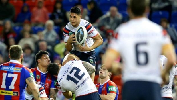 High flyer: Roger Tuivasa-Sheck takes off for the Roosters.