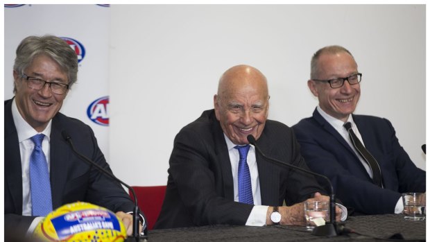 News executives Mike Fitzpatrick, Rupert Murdoch and Robert Thompson announce a 2 billion dollar Foxtel deal at AFL Headquarters in 2015.