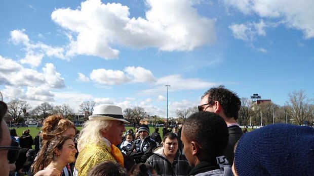 Magpie cheer squad icon Joffa holds court at Collingwood training.