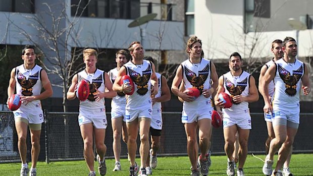 Hawthorn players unveil their new clash guernsey.