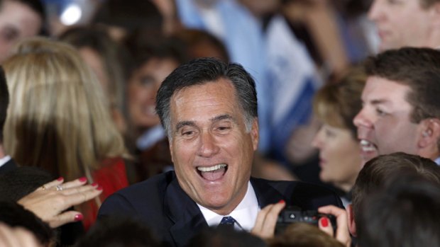 US Republican presidential candidate Mitt Romney greets supporters in Illinois.