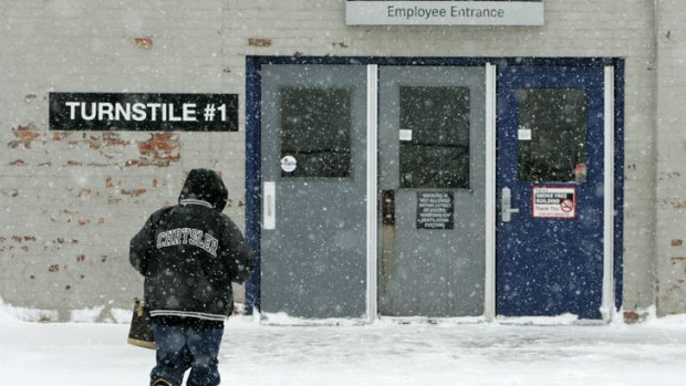 A severe winter in the US has been blamed for a slowdown in the economy and stalled consumer spending.