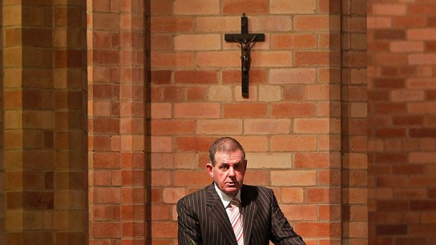 Peter Slipper delivers a reading at the parliamentary ecumenical service at St Paul's Anglican Church in Canberra.