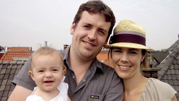 On a plane home ... Melinda Taylor with husband, Geoffrey Roberts, and daughter, Yasmina.