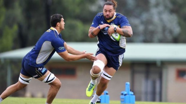 Fotu Auelua, right, is set to make his comeback this weekend against the Sharks.