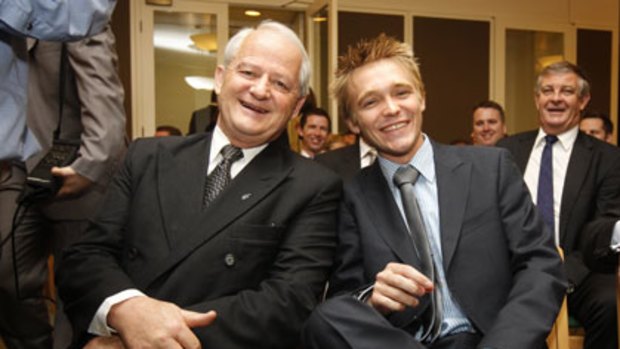 Up close and personal ... Philip Ruddock with the MP for Longman, Wyatt Roy, at  the   party meeting in Canberra yesterday.