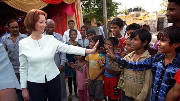Slanting young &#8230; Julia Gillard meets Indian children.