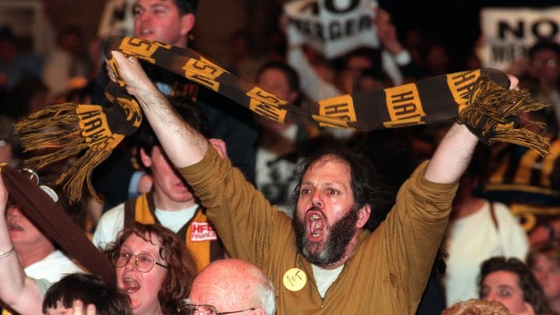 Angry Hawthorn supporters at the merger meeting at Camberwell Civic Centre.