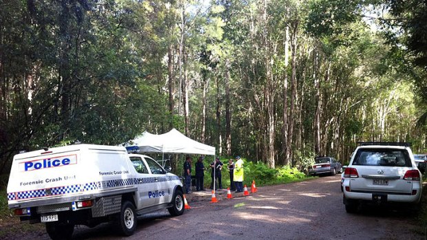 Police investigate at the scene where the body of a woman was found in a burnt-out car in the Tanawha area on the Sunshine Coast. Photo: Cade Mooney,  <B><A href= http://www.sunshinecoastdaily.com.au/> Sunshine Coast Daily</a></b>