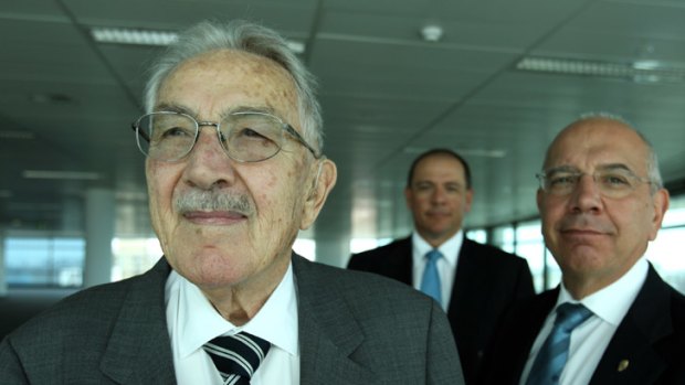 The late Carlo Salteri (left) with Robert Salteri and Paul Salteri and (below) the Williamstown shipyards.