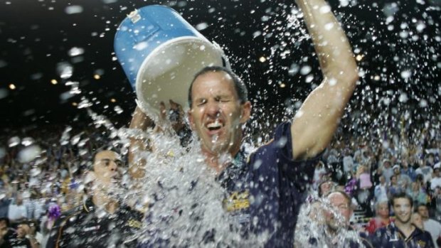 Brian Goorjian gets a soaking from CJ Bruton as the Kings celebrate the three peat in 2005.