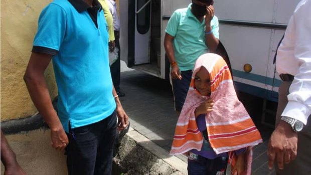 A child arrives in the Galle court after being returned by Australian authories to Sri Lanka.