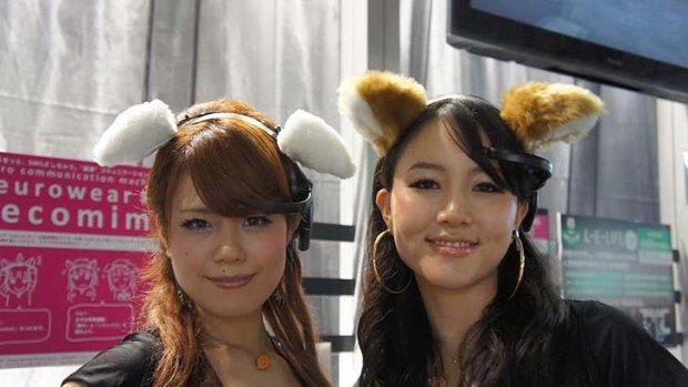 Ears looking at you kid ... models wear the necomimi, or cats' ears.