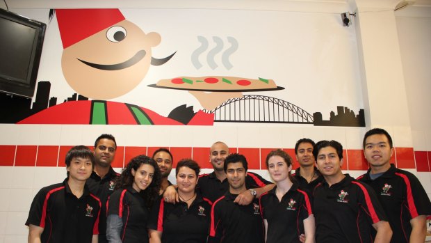 Owner Charlie Hoyek (centre) and his crew at Manoosh Lebanese Pizzeria.