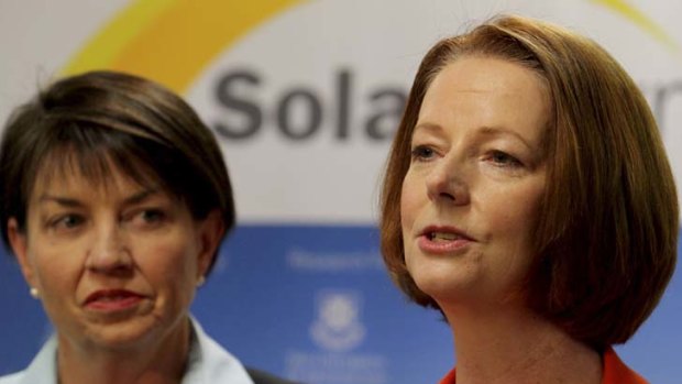 Follow the leader ... Queensland Premier Anna Bligh and Julia Gillard at the state conference yesterday.