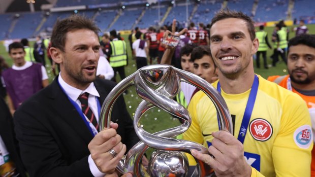 Proud moment: Wanderers coach Tony Popovic and Ante Covic after the Asian Champions League final win against Saudi Arabia's Al Hilal.