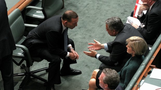 Strained relationship: The Prime Minister and the Treasurer disagree over how best to handle the budget, sources say.