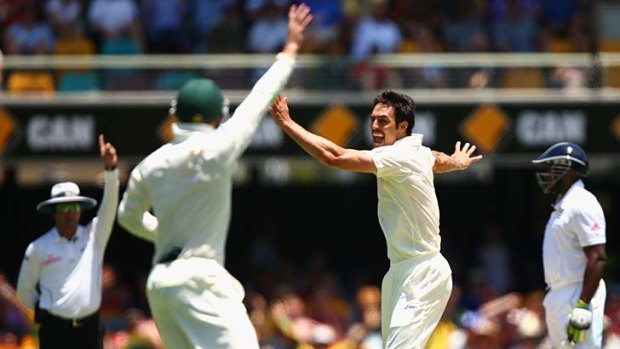 Timely dismissal ...  Mitchell Johnson removed Jonathan Trott with the final ball before lunch.